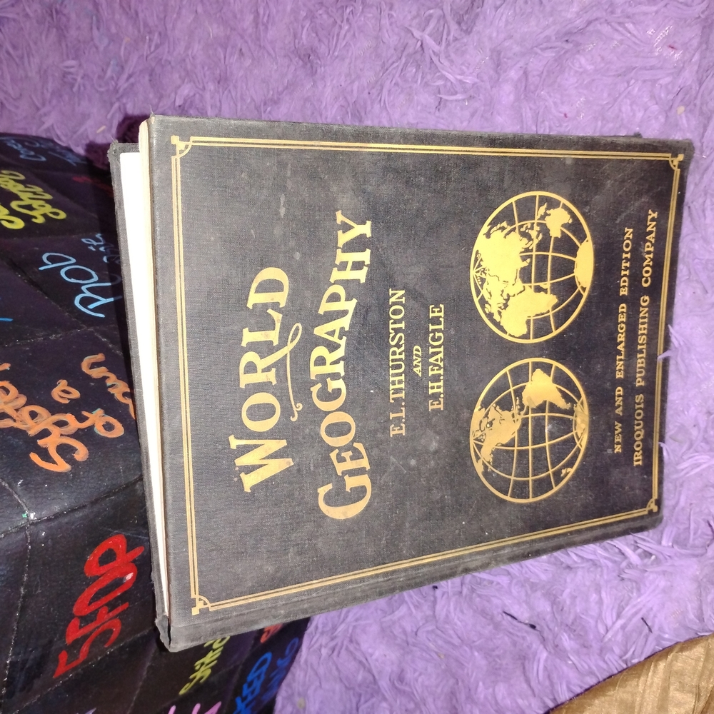 World Geography Book by E.J. Thurston - Black and Gold Cover